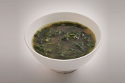 Miso soup with steamed spinach and garlic